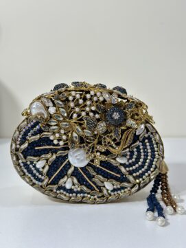 Seize this sapphire reverie: limited stock ensures exclusivity. Let Sapphirus carry your secrets through starlit nights. Includes complimentary dust bag and free shipping on orders over $100. #SapphirusClutch #NavyEveningBag #PearlHandbag