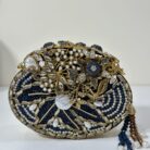 Seize this sapphire reverie: limited stock ensures exclusivity. Let Sapphirus carry your secrets through starlit nights. Includes complimentary dust bag and free shipping on orders over $100. #SapphirusClutch #NavyEveningBag #PearlHandbag